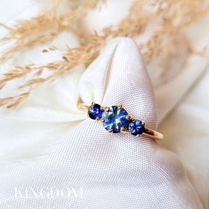 Stunning blue sapphire linear engagement ring